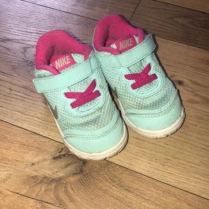 Baby girl Nike tennis shoes.